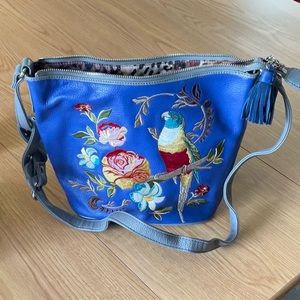 Like new condition Sharif 1827 Embroidered leather.